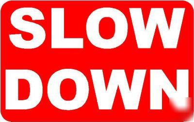 Slow down sign/notice