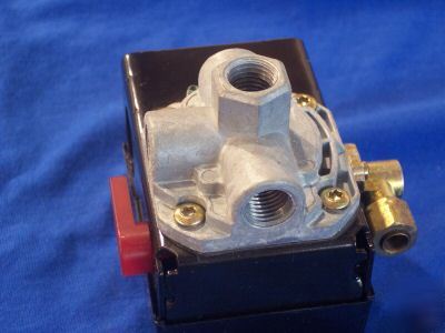 Air compressor multiple port pressure switch with bleed