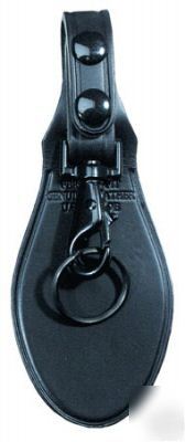 Key holder with black leather back flap