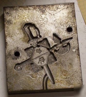 Heraldic decoration mold for injection molder