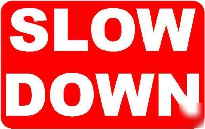 Slow down sign/notice