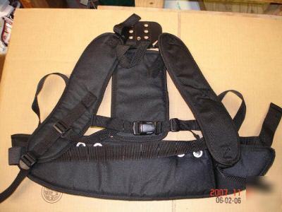 Harness for the dust care back pack vacuum