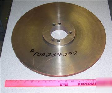 Oval strapping wrapper retaining disc # 1650P