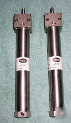 Two aurora 11SS11C44E6K stainless steel air cylinders