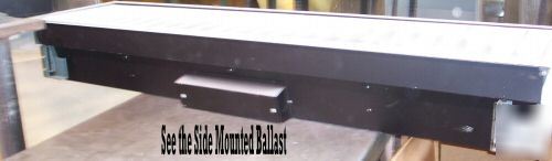 Large rectangle 4' fluorescent light fixtures