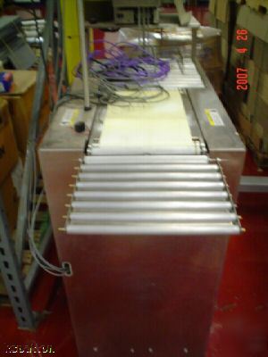 Toledo check weigher with auto ticket print and apply