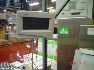 Toledo check weigher with auto ticket print and apply