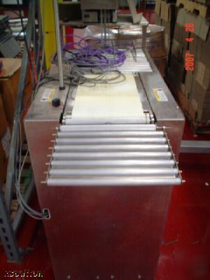 Toledo check weigher with auto ticket print and apply
