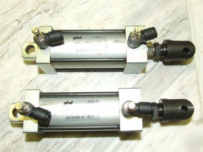 (2) phd air cylinders,w/flow cntrls, AVP1-1/8X1-3/4-e