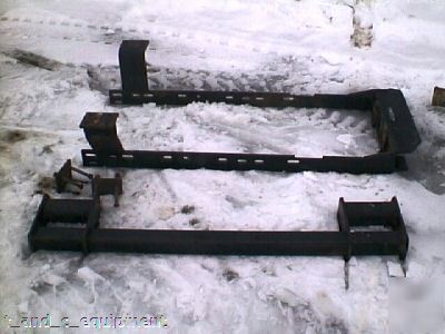 Dun ham lehr inc. loader,brackets,3 buckets,hoses bin 