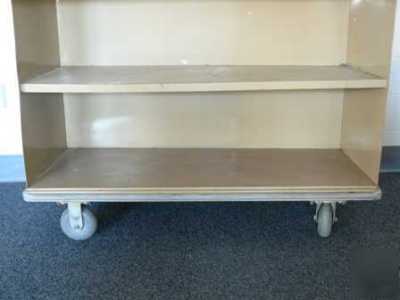 Rolling metal shelving unit