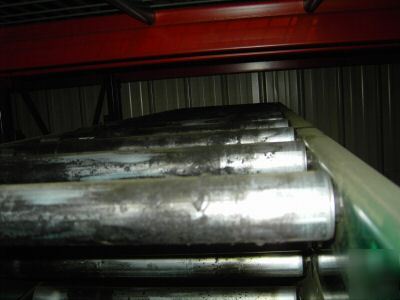 Rapistan belt over roller intermediate bed