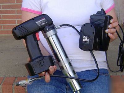 New h.d.cordless grease gun w/2-18V rechargeable