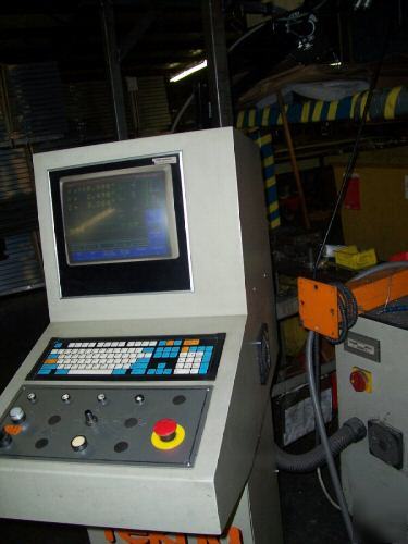 Tekna vertical aluminum machining center elumatic 