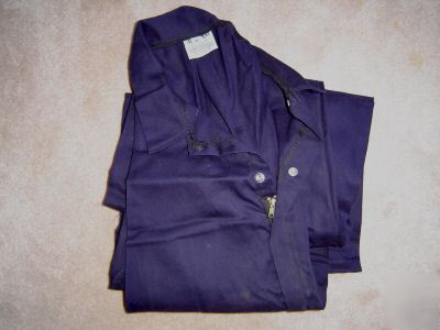 New flame retardant indura coveralls, size 3X, blue. 