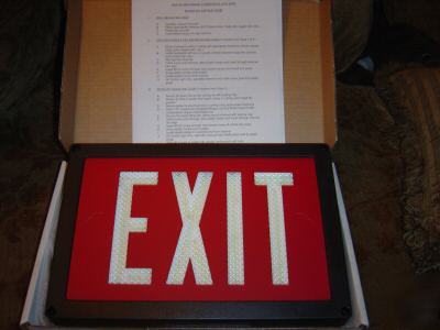 Self luminous exit sign 