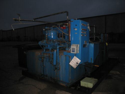 Industrial machine coolant recovery system