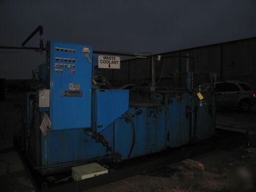 Industrial machine coolant recovery system